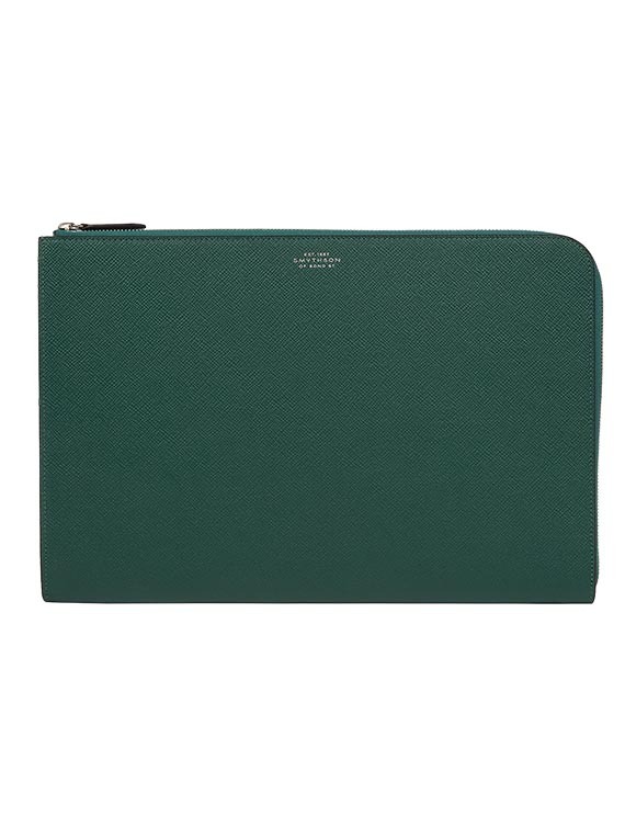 Smythson small laptop case in Panama in Forest, £550 (smythson.com/uk/)