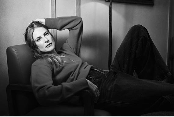 Rosalie Craig wears jumper and jeans by The Label Edition